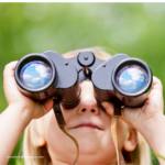 image of kid with binoculars as example of a visual learner