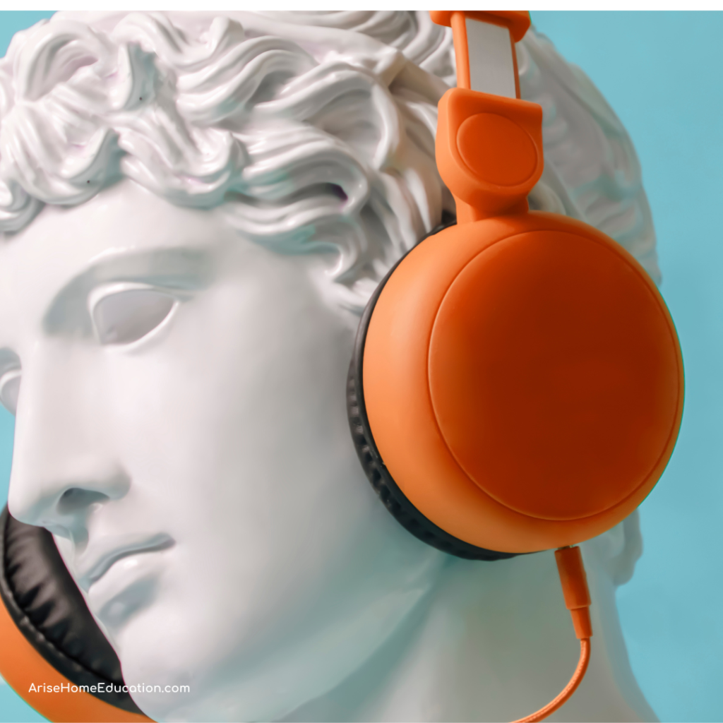 image of statue with headphones. Auditory learners love listening to learn