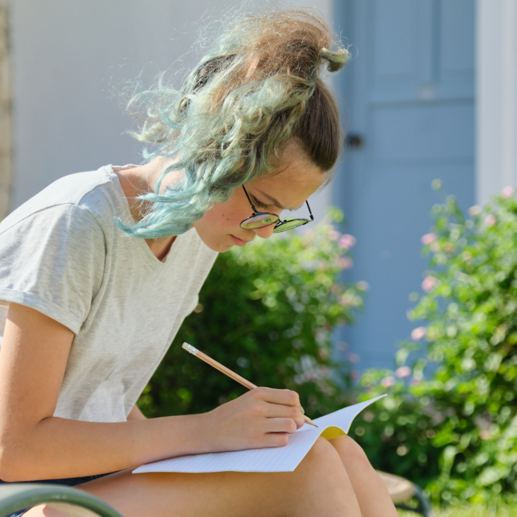 image of female reading and writing learner. Learn more about this learning style at AriseHomeEducation.com