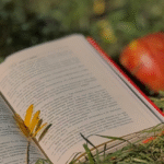 image of book with apples and leaves for Charlotte Mason Home Education Method for AriseHomeEducation.com