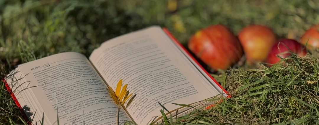 image of book with apples and leaves for Charlotte Mason Home Education Method for AriseHomeEducation.com
