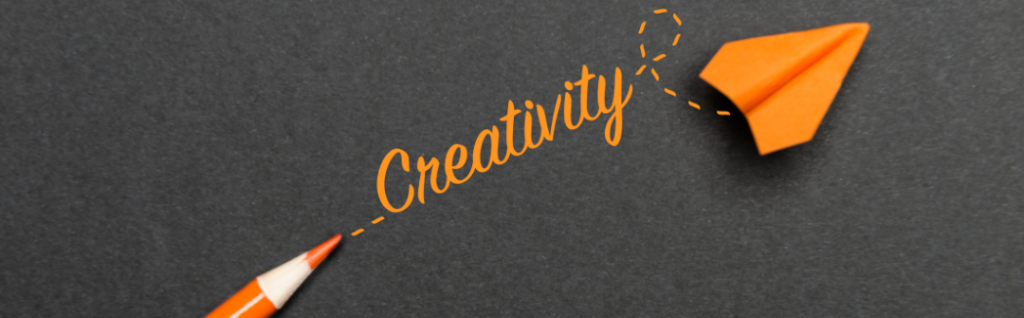 image of orange pecil with writing and paper airplane. 'Creativity' with the UK Arts Awards for Teens with a Christian worldview at Arise Home Education