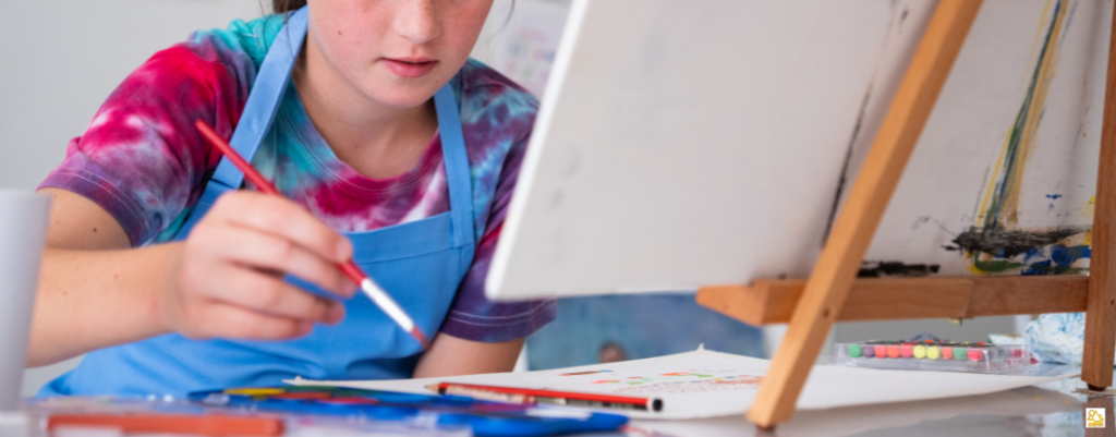 image of student painting. Art Lessons for Teens without the Worldview Compromise from AriseHomeEducation.com
