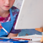 image of student painting. Art Lessons for Teens without the Worldview Compromise from AriseHomeEducation.com