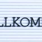 image of German greeting with text overlay. How to learn German for home educators from AriseHomeEducation.com
