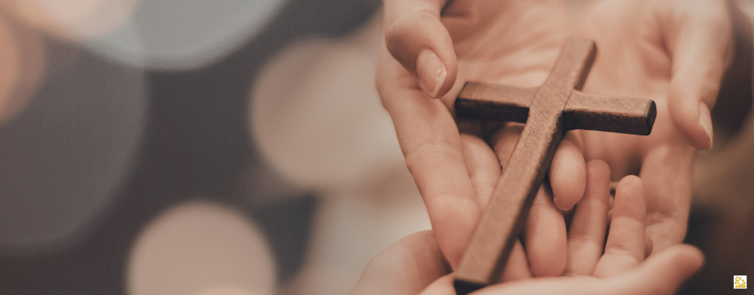 image of hands and cross for Education as Discipleship at Arise Home Education