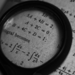 image of algebra problems and magnifying glass from AriseHomeEducation.com representing A closer look at God and Mathematics in Christian Home Education