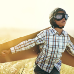 image of boy with flight wings and goggles for secondary readiness in maths and english