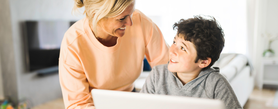 image of mum and son using Digital Planning for HOme Educators at Arise Home Education