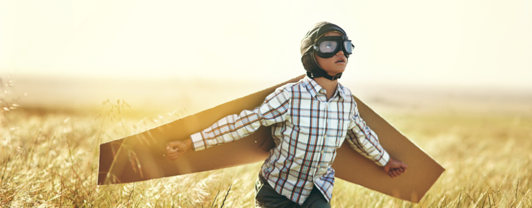 image of boy with flight wings and goggles for secondary readiness in maths and english